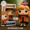 Funko Pop Beth Dutton figure in orange coat and black dress.