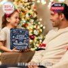 Father and daughter smiling while holding the New York Yankees Advent Calendar during the holidays.