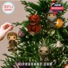 Hobbit and Lord of the Rings ornaments, including Bilbo, Gandalf, Smaug, and Gollum, on a Christmas tree.