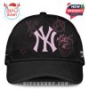 Black Yankees hat with pink MGK graphics and signatures.