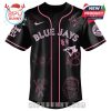Front view of black Blue Jays MGK jersey with pink piping and graphics.