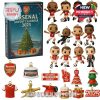 Mini Arsenal player figures and Christmas-themed items from 2025 advent calendar.