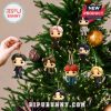 ATEEZ character ornaments hanging on Christmas tree.
