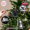 Black Sabbath themed Christmas ornaments including bauble, bell, Ozzy figure, and snow globe.
