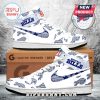 Pair of white custom Buffalo Bills high top sneakers with blue swoosh and all over team graphics!