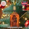 Mini Elmer T. Lee bourbon bottle hanging as ornament on Christmas tree.