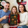 Happy family holding Bigfoot Advent Calendar 2025 in a festive living room.