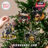 Guns N' Roses-themed ornaments hanging on a decorated Christmas tree.