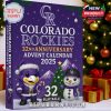 Close-up of Colorado Rockies advent calendar box under Christmas tree with ornaments and presents.
