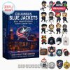 Columbus Blue Jackets advent calendar box with collectible figures and team-themed Christmas ornaments around it.