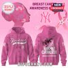 New York Yankees pink hoodie with Breast Cancer Awareness Month logo and pink ribbon design.