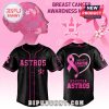 Houston Astros Breast Cancer Awareness shirt and cap with pink ribbon design.