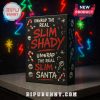 Slim Santa advent calendar box with graffiti-style design and neon holiday lights in the background.