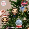 Gilmore Girls ornaments hanging on a Christmas tree, featuring characters and locations from the show.