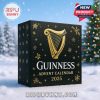 Front corner view of the black and gold Guinness Advent Calendar 2025 box in a snowy scene!