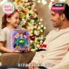 Girl giving Hocus Pocus Advent Calendar to man by a Christmas tree!