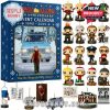 Home Alone Advent Calendar box displayed next to a group of character ornaments!