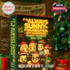 Always Sunny advent calendar box in front of a Christmas tree and pub-themed background with wrapped gifts.