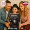 Smiling family holding the Linkin Park Advent Calendar 2025 box together.