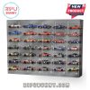 24 race cars neatly arranged in a display case, showcasing their intricate designs.