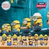 Complete set of Minion figurines from the Advent Calendar displayed on wood surface.