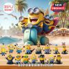 Collection of detailed Minions figurines displayed on a wooden surface with beach background.