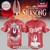 A collection of four different fan made Hollow Knight Silksong baseball jerseys with MLB team logos!