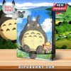 Totoro advent calendar with festive design and numbered windows for Christmas countdown.