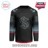 A black jersey with a futuristic logo, blue stripes, and red accents, with a customizable name section on the back.