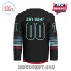 The back of a black jersey with customizable name and number, featuring blue stripes and red accents.