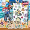 Ash Ketchum with Pokémon figurines and an advent calendar featuring Pokémon characters.