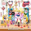Sailor Moon Advent Calendar with figurines of Sailor Scouts in front of a colorful cosmic background.