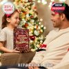 Father and daughter holding the San Francisco 49ers Advent Calendar 2025 box next to a Christmas tree!