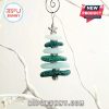 A sea glass Christmas tree with green and blue hues, topped with a starfish.