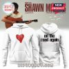 White hoodie with red heart on the front and Shawn Mendes 2025 tour schedule on the back.