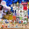 Snoopy advent calendar and mini Snoopy figures in front of a festive blue Christmas tree with holiday decorations!