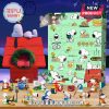 Mint green Snoopy advent calendar with mini Christmas-themed figurines.