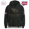 Front of a black hoodie with Tennessee Titans logo, Salute to Service text, and patriotic patches.