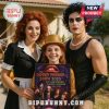 Family dressed as Rocky Horror Show characters, holding the 2025 Advent Calendar.