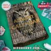 Owl Advent Calendar box on green table surrounded by wrapping paper and scissors.