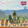 Mini Zelda figures and collectible items from advent calendar with mountain background.
