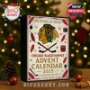 A decorated advent calendar box for Chicago Blackhawks with holiday and hockey-themed designs placed against a glowing Christmas tree backdrop!