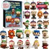 A black advent calendar box labeled South Park 2025, surrounded by colorful acrylic ornaments of all main characters, each in a holiday theme and ready to hang.