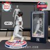 David Bednar smiling figure in walking stance, Yankees attire, with product packaging and digital model on display screen!