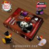 A boxed horror rubber duck set displayed with vampire, zombie, and witch-themed ducks scattered nearby for added visual appeal!
