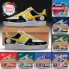 Multiple pairs of NFL-inspired sneakers in custom team colors with personal name space, logos, and team branding!