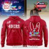 A red San Francisco 49ers hoodie with BIPU BUNNY design for the Super Bowl 2026.