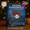 A festive collector’s box showing the Diamondbacks emblem, twinkling lights, and tribute text about their 2001 World Series championship on a holiday night scene!