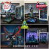 Avatar Jake Sully action figure displayed with spear on glowing terrain base and boxed packaging next to digital model rendering on a monitor!