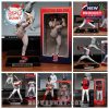 Various collectible Boston Red Sox player figurines in different poses, displayed with their names and numbers.